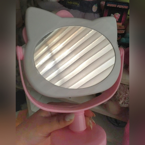 New Hello Kitty pink rotating makeup mirror approximately 9" tall. - Picture 3 of 5